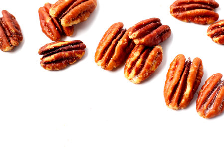 Delicious salted pecan nuts scattered.の写真素材