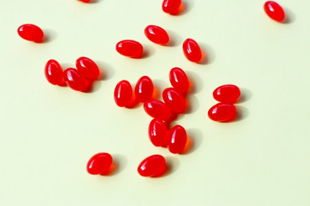 Red softgel Q10 capsules for dietary supplement.の写真素材