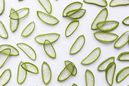 Sliced aloe vera pieces with translucent gelの写真素材