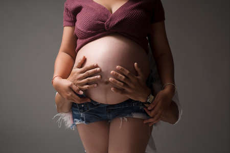 Pregnancy of pregnant mother with fatherの写真素材