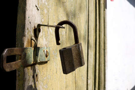 Old rusty lock on the doorの写真素材