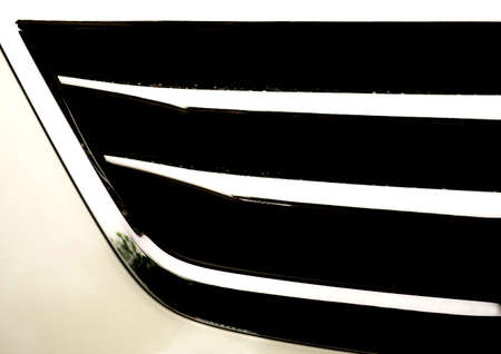 Part of chrome radiator of white sport modern carの写真素材