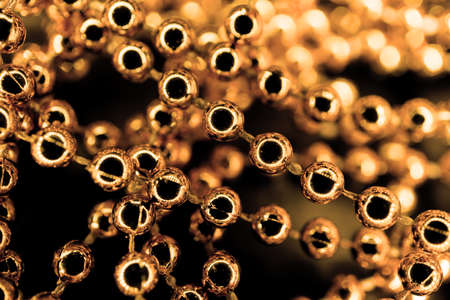 Red gold pearl necklace macro abstract backgroundの写真素材