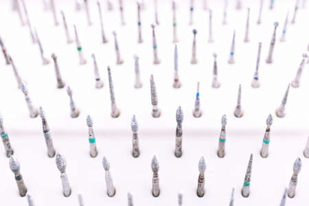 Set of dental burs macro blurred backgroundの写真素材