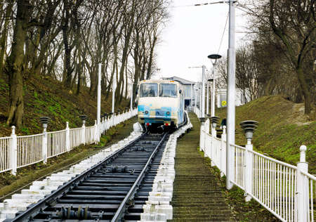 Kiev, Ukraine - March 8, 2016: White funicular train coming down with passengersのeditorial素材