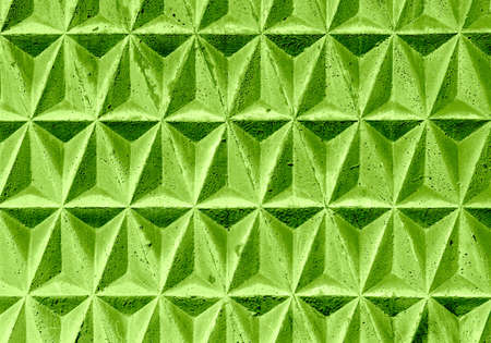Green texture of geometric triangular decorative tiles