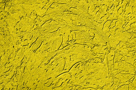 Texture of old vintage gold plaster wallの写真素材
