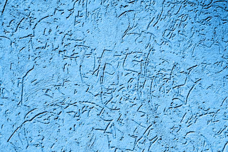 Texture of old vintage blue plaster wallの写真素材