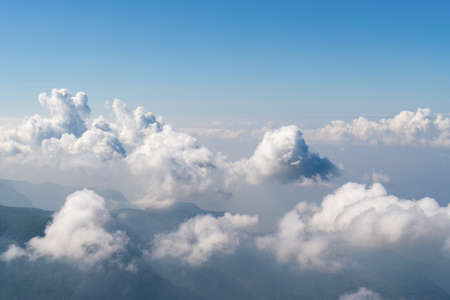 Beautiful Cloudscape. Aerial view of clouds and sky. Bird eye view from airplane window. Clouds panorama from airplane. High resolution photoの写真素材