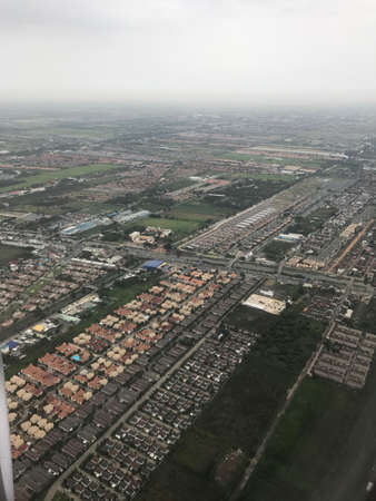 Top view which took from airplane shows landscape view of Bangkok, Thailand.の写真素材