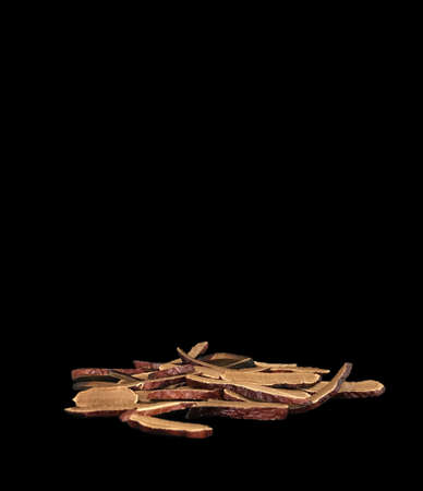 Dried Lingzhi mushroom or Reishi mushroom are sliced and put on the clean white background. Isolated...