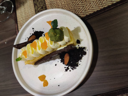 The home cake is decorated with fresh fruits. Homemade classic pie and cake or biscuit sprinkled...