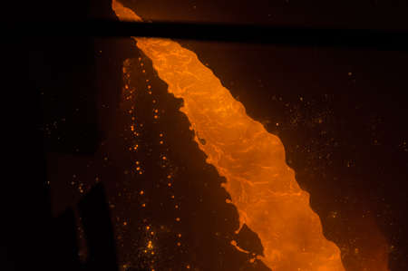 Liquid iron coming out of blast furnaceの写真素材