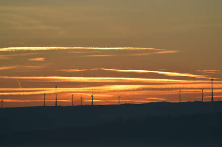 Windmill at early sunriseの写真素材