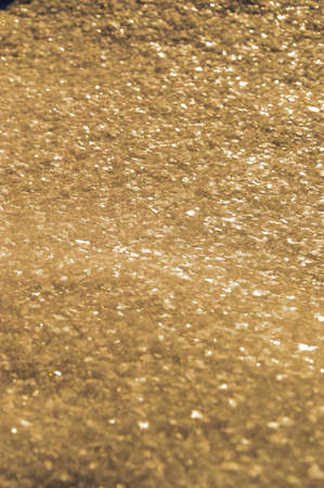 Sparkling snow flakes in winter sunの写真素材