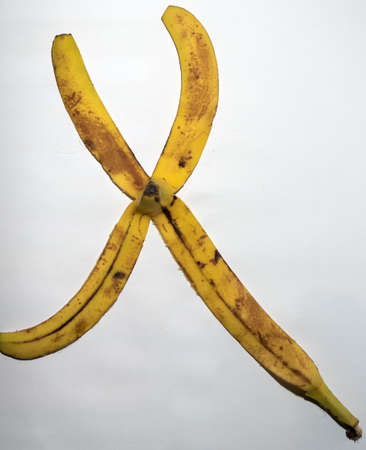 Realistic picture of half eaten bananaの写真素材