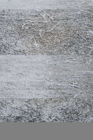 hoar frost covered asphalt street