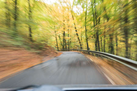 danger situation on slippy autum roadの写真素材