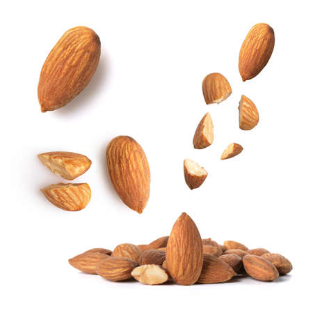 Set almonds isolated on white background. Concept of Almonds is torn to pieces close-upの写真素材