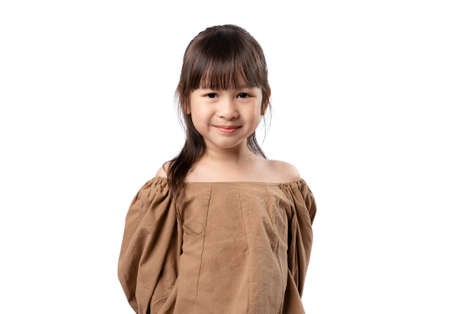 Portrait of smiling young happy asian girl, isolated on white backgroundの写真素材