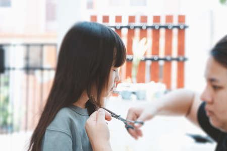 Haircuts for Asian girls on the side. Hair care conceptの写真素材