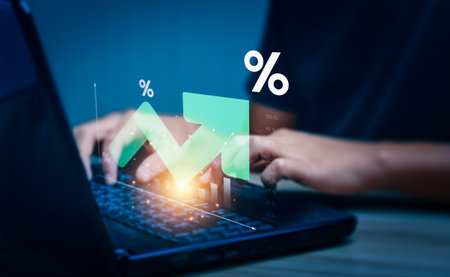 Interest rate and dividend concept, Businessman is calculating income and return on investment in percentage. income, return, retirement, compensation fund, investment, dividend tax, stock marketの写真素材