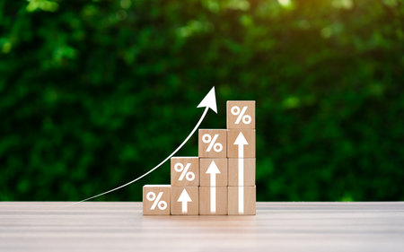Interest rate financial and mortgage rates concept. Wooden blocks with Icon percentage symbol and...