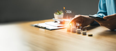 financial business growth 2024, businessman calculating financial for long-term investments, strategy digital marketing, profit income, economy, stock market trends, technical analysis strategyの写真素材