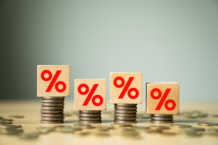 Increasing Interest Rates and Financial Growth Concept with Percent Symbols on Wooden Blocks and...