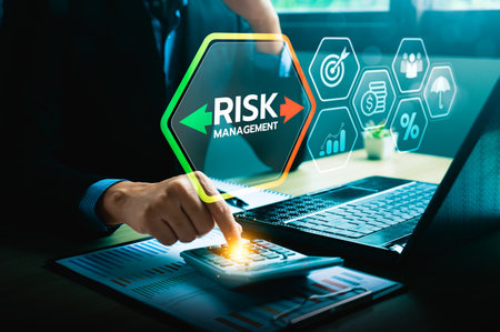Business Professional Analyzing Risk Management Strategies with Digital Dashboard, Calculator, and Financial Data for Decision Making and Corporate Security Solutions, Financial riskの写真素材