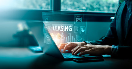 Businessman using digital leasing platform for car and property rental contract, online finance management, financial agreement, asset leasing, and modern investment service conceptの写真素材