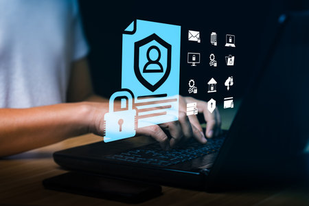 Cybersecurity and data privacy protection with user identity document icon, security lock, and digital information safety concept on laptop for internet security, GDPR, and personal data protectionの写真素材