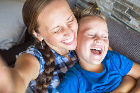 Mother And 4 year old Son Posing For Selfieの写真素材