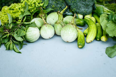 Green vegetables and herbsの写真素材