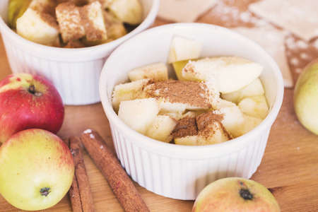 Red apples, cinnamon for apple pie
