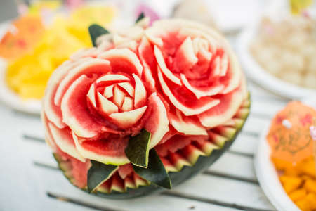 Fruit carvings on the buffet tableの写真素材