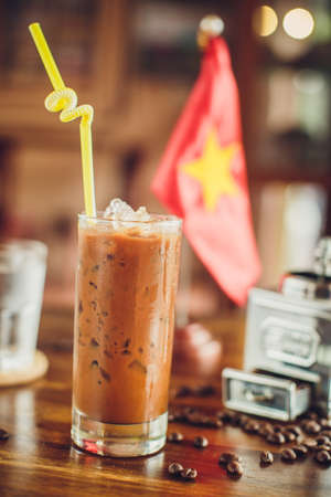 Vietnamese ice coffee with coffee beansの写真素材