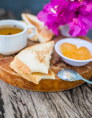 Toast with pineapple jam and tea. Breakfast Rusticの写真素材