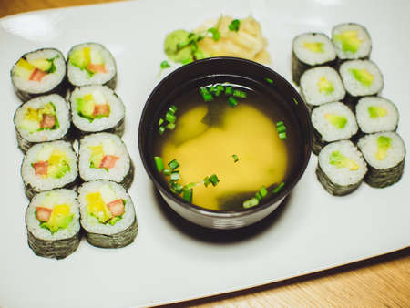 Vegetarian sushi and miso soup in  restaurantの写真素材
