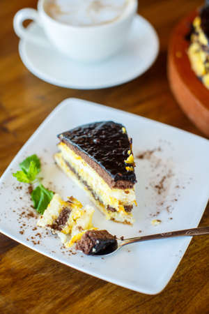 Chocolate orange cake and cappuccino