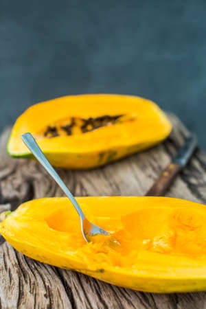 Papaya on wooden boardの写真素材