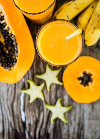 Tropical smoothie with papaya and bananaの写真素材