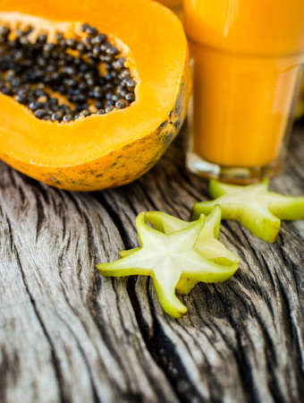 Tropical smoothie with papaya and bananaの写真素材