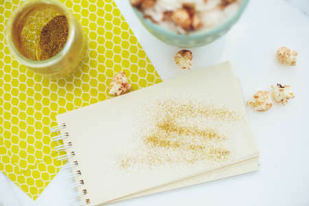 Notebook and Coffee with Chocolate Popcorn. Creative Concept