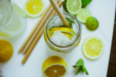 Home Kombucha with lime and lemon in the bottle