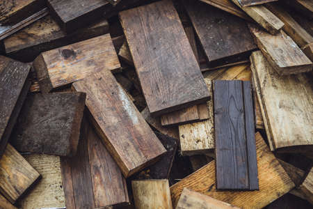 Firewood background - chopped firewood on a stackの写真素材