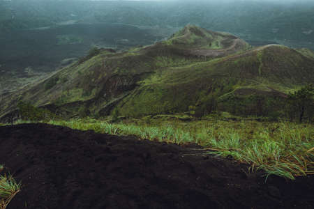 Beautifull mountain in the morning mist , Batur, Bali,  Indonesiaの写真素材
