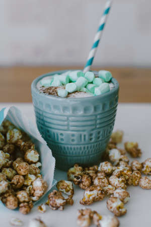 Chocolate Popcorn and Coffee with Marshmallows Cinema Conceptの写真素材