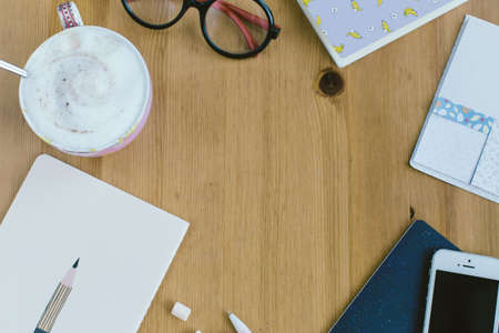 Top View of  Working Woman's items, Workspace with essential items of business woman