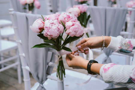 Wedding decor concept. Decoration chairs flowersの写真素材